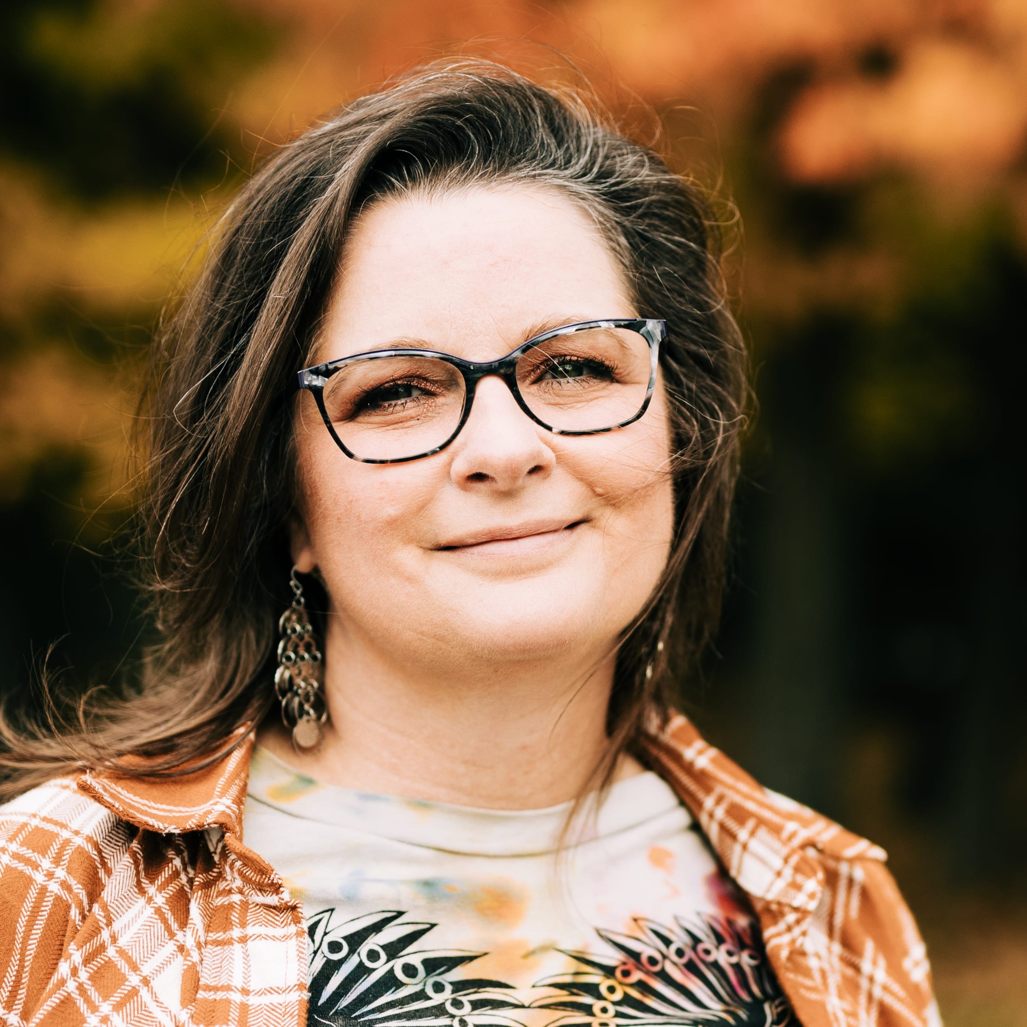 Sarah Domin smiling outdoors